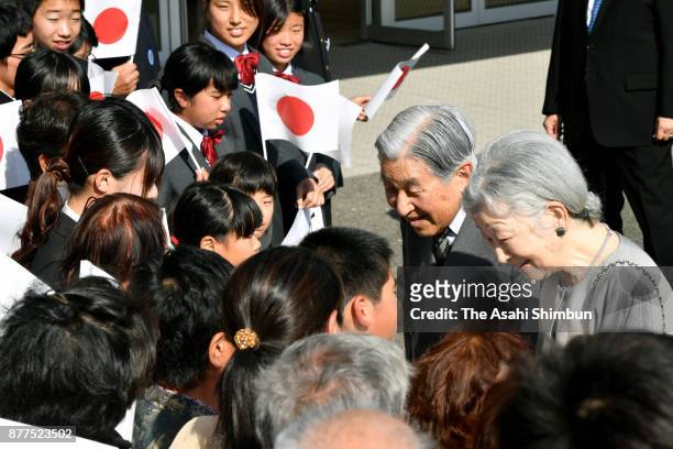 Emperor Akihito and Empress Michiko talk with residents on November 16, 2017 in Yakushima, Kagoshima, Japan.