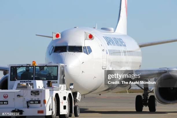 An airplane carrying Emperor Akihito and Empress Michiko taxis at Haneda Airport on November 16, 2017 in Tokyo, Japan.
