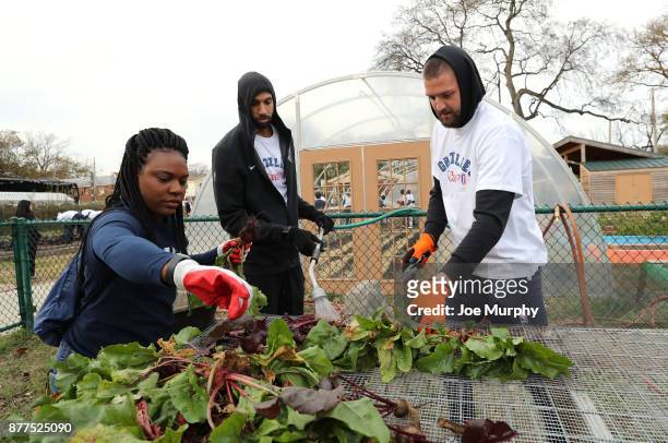 Brandan Wright and Chandler Parsons of the Memphis Grizzlies participates in a Thanksgiving giveaway on November 21, 2017 at Green Leaf Learning Farm...