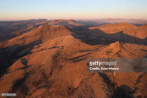 Rugged terrain stretches through the Big Bend area of west Texas, as seen from a Customs and Border Protection helicopter on November 22, 2017 near...