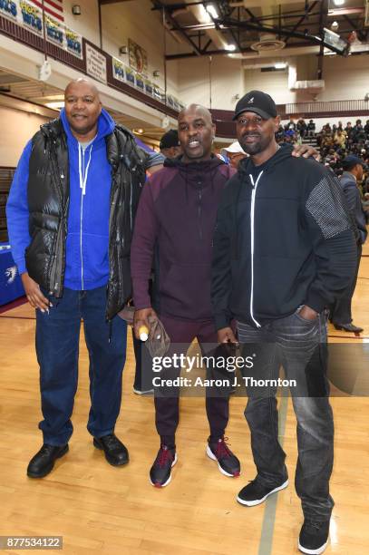 Former NBA and NFL athletes Derrick Coleman, Gary Payton, and Herman Moore attend the 2017 Annual AllStar Giveback: Thanksgiving Edition on November...