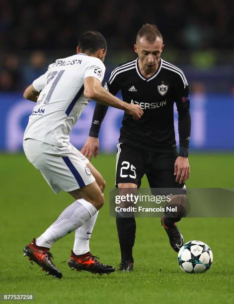 Ansi Agolli of Qarabag FK and Davide Zappacosta of Chelsea battle for possession during the UEFA Champions League group C match between Qarabag FK...