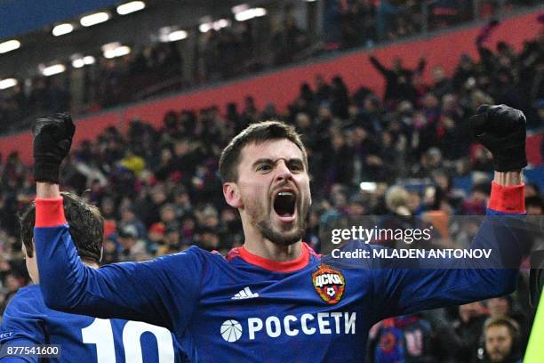 Moscow's defender from Russia Georgy Shchennikov celebrates after scoring a goal during the UEFA Champions League Group A football match between PFC...