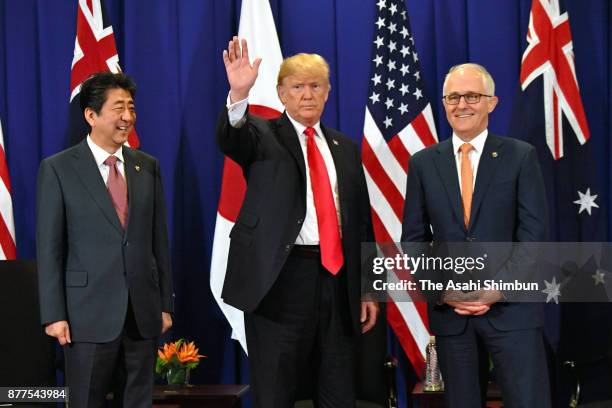 Japanese Prime Minister Shinzo Abe, U.S. President Donald Trump and Australian Prime Minister Malcolm Turnbull attend their trilateral meeting on...