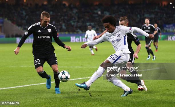 Willian of Chelsea and Jakub Rzezniczak of Qarabag FK battle for possession during the UEFA Champions League group C match between Qarabag FK and...