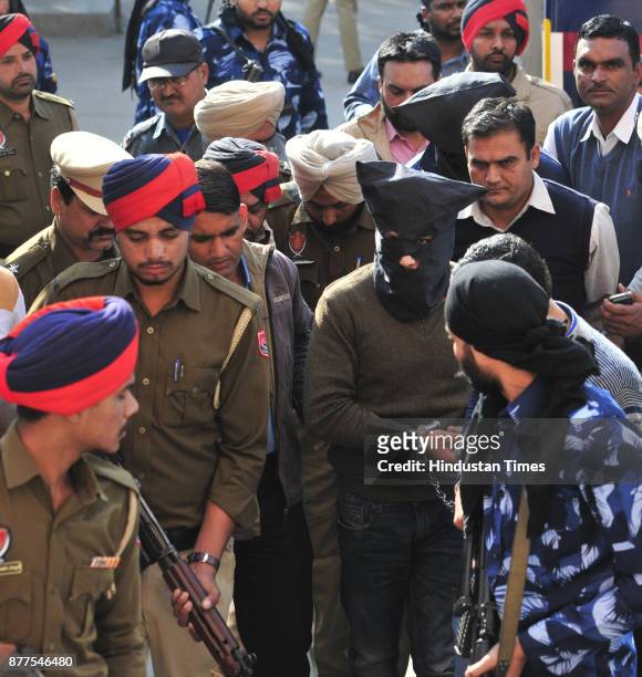 Team along with Punjab police coming out with Ramandeep Singh Canadian and Hardeep Singh Shera after hearing at NIA Special court in targeted...