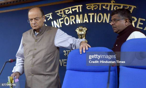 Union Finance Minister Arun Jaitley and Minister of Law and Justice Ravi Shankar Prasad arrive for the press conference after cabinet meeting at PIB...