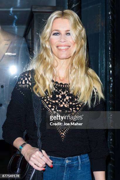 Claudia Schiffer poses at a photocall ahead of meeting fans and signing copies of her new self titled book at The Kingsman Shop on November 22, 2017...