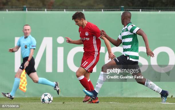 Olympiakos Piraeus Voilis with Sporting CP Tiago Djalo in action during the UEFA Youth League match between Sporting CP and Olympiakos Piraeus at CGD...