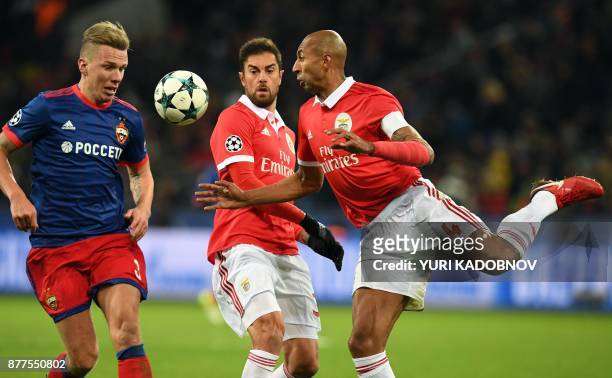 Moscow's midfielder from Sweden Pontus Wernbloom, Benfica's defender from Brazil Jardel and Benfica's defender from Brazil Luisao vie for the ball...