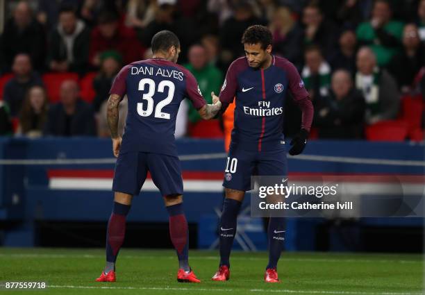 Neymar of PSG celebrates scoring his team's first goal with Dani Alves during the UEFA Champions League group B match between Paris Saint-Germain and...