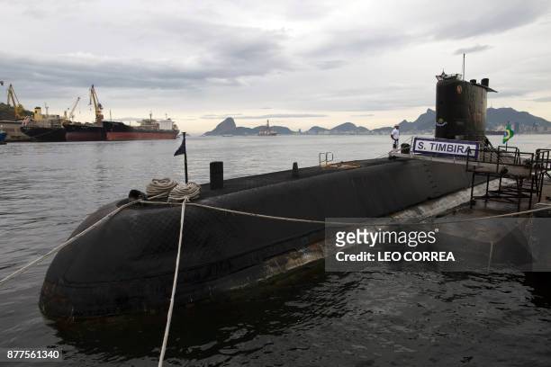 View of Brazilian submarine Timbira anchored during a presentation to the press in Rio de Janeiro, Brazil, on November 22 whilst other vessels and...