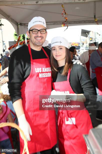 Writer/producer Sam Esmail and actress Emmy Rossum are seen at the Los Angeles Mission Thanksgiving Meal for the homeless at the Los Angeles Mission...