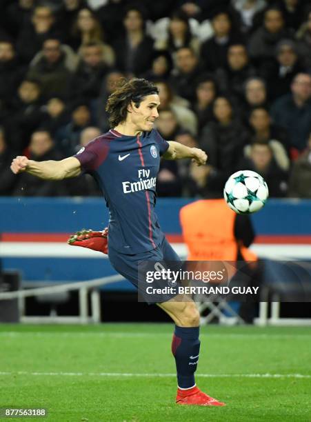 Paris Saint-Germain's Uruguayan striker Edinson Cavani shoots towards goal during the UEFA Champions League Group B football match between Paris...