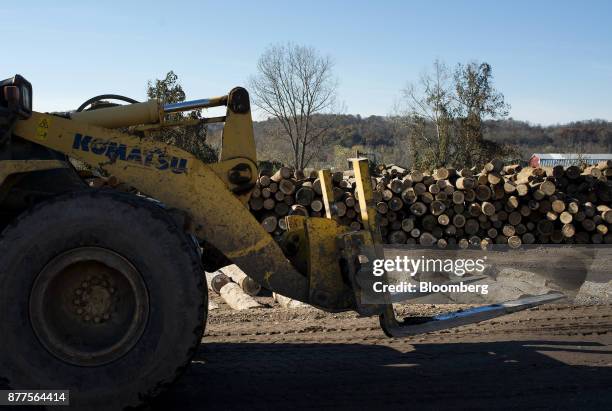 An employee operates a Komatsu Ltd. WA250 wheel loader at the Cyblair Sawmill in West Columbia, West Virginia, U.S., on Friday, Nov. 17, 2017. Lumber...