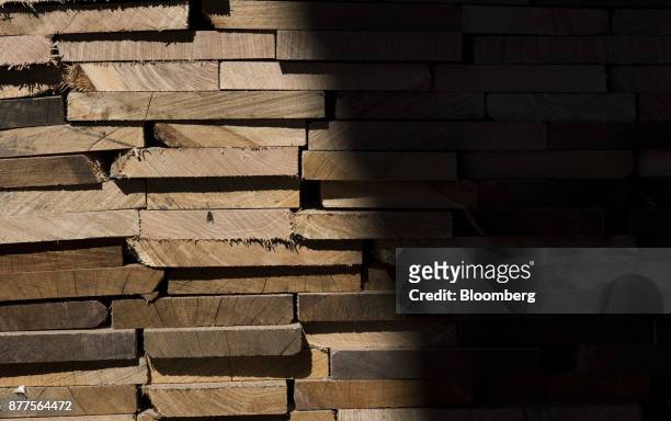 Stacks of green lumber sit inside the Cyblair Sawmill in West Columbia, West Virginia, U.S., on Friday, Nov. 17, 2017. Lumber prices are trading at a...