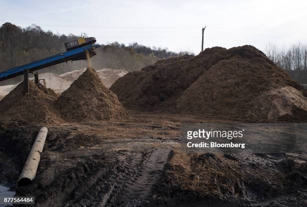 Piles of mulch are seen as bark is removed from logs entering the Cyblair Sawmill in West Columbia, West Virginia, U.S., on Friday, Nov. 17, 2017....