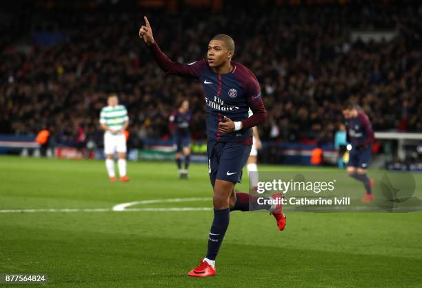 Kylian Mbappe of PSG celebrates after scoring his sides fourth goal during the UEFA Champions League group B match between Paris Saint-Germain and...