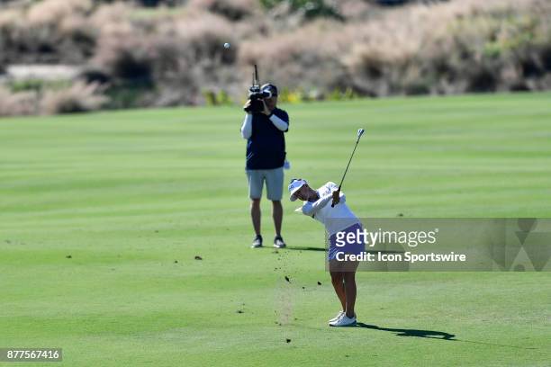 Pernilla Lindberg of Sweden hits her approach shot on the thirteenth hole during the final round of the LPGA CME Group Championship at Tiburon Golf...