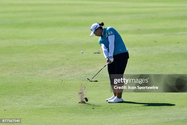 Amy Yang of the United States plays her approach shot on the thirteenth hole during the final round of the LPGA CME Group Championship at Tiburon...