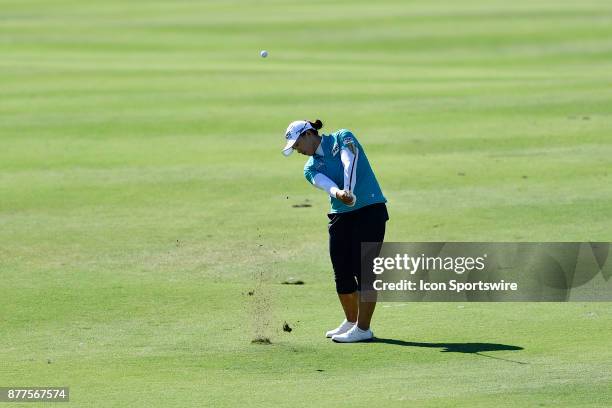 Amy Yang of the United States plays her approach shot on the thirteenth hole during the final round of the LPGA CME Group Championship at Tiburon...