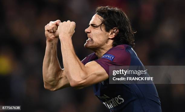 Paris Saint-Germain's Uruguayan striker Edinson Cavani celebrates after scoring during the UEFA Champions League Group B football match between Paris...