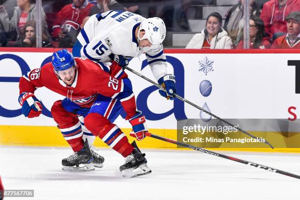 Jeff Petry of the Montreal Canadiens challenges Matt Martin of the Toronto Maple Leafs during the NHL game at the Bell Centre on November 18, 2017 in...