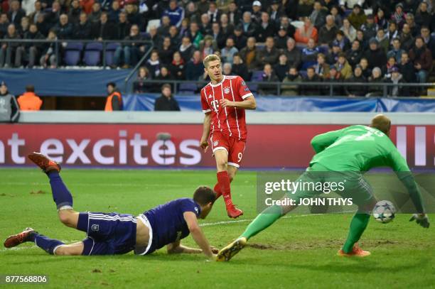 Bayern Munich's Polish forward Robert Lewandowski kicks to score a goal during the UEFA Champions League Group B football match between Anderlecht...