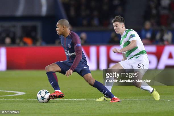 Kylian Mbappe of Paris Saint-Germain and Kieran Tierney of Celtic Glasgow fight for the ball during the UEFA Champions League group B match between...