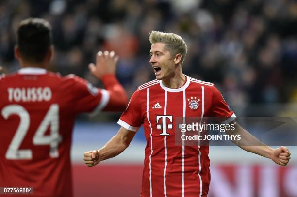 Bayern Munich's Polish forward Robert Lewandowski celebrates after scoring a goal during the UEFA Champions League Group B football match between...