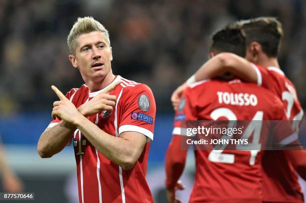 Bayern Munich's Polish forward Robert Lewandowski celebrates after scoring a goal during the UEFA Champions League Group B football match between...