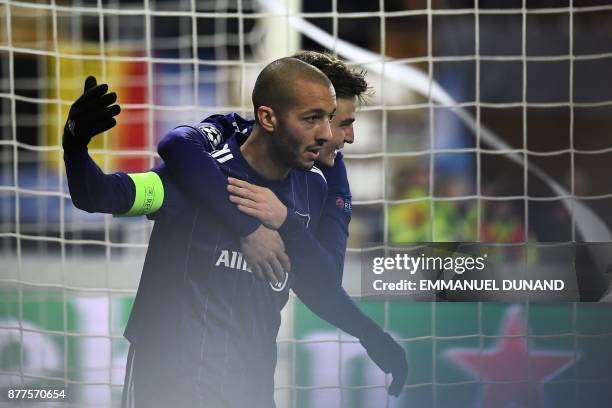 Anderlecht's Algerian midfielder Sofiane Hanni celebrates after scoringa goal during the UEFA Champions League Group B football match between...