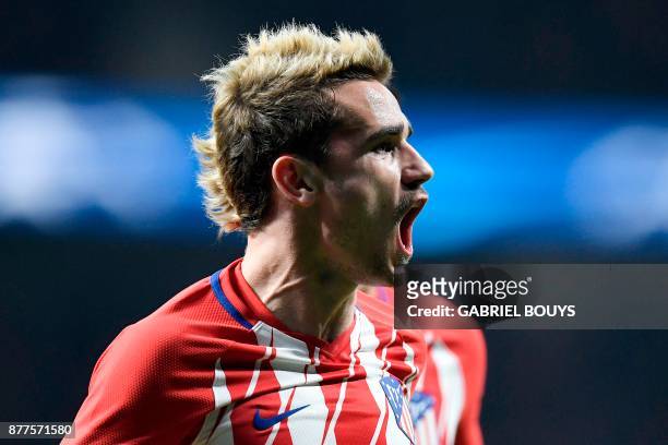 Atletico Madrid's French forward Antoine Griezmann celebrates after scoring a goal during the UEFA Champions League group C football match between...