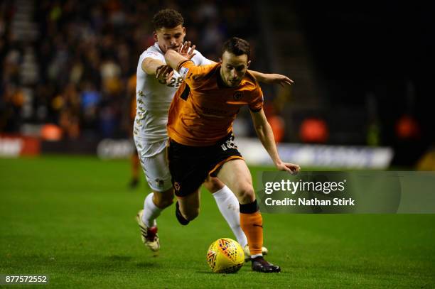 Diogo Jos Teixeira da Silva of Wolverhampton Wanderers and Kalvin Phillips of Leeds United in action during the Sky Bet Championship match between...