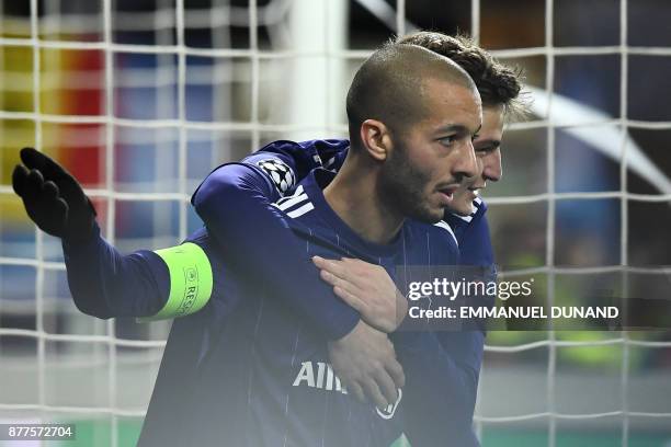 Anderlecht's Algerian midfielder Sofiane Hanni celebrates after scoring a goal during the UEFA Champions League Group B football match between...