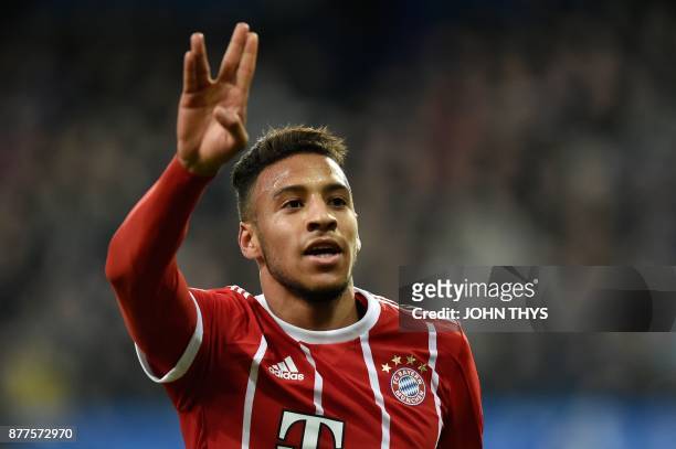 Bayern Munich's French midfielder Corentin Tolisso celebrates after scoring a goal during the UEFA Champions League Group B football match between...