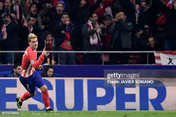 Atletico Madrid's French forward Antoine Griezmann celebrates after scoring a goal during the UEFA Champions League group C football match between...