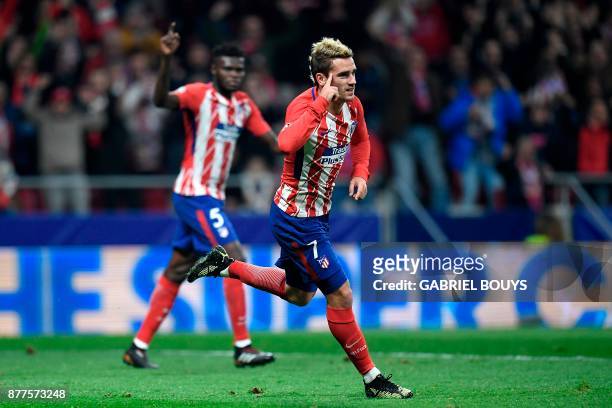 Atletico Madrid's French forward Antoine Griezmann celebrates after scoring a goal during the UEFA Champions League group C football match between...