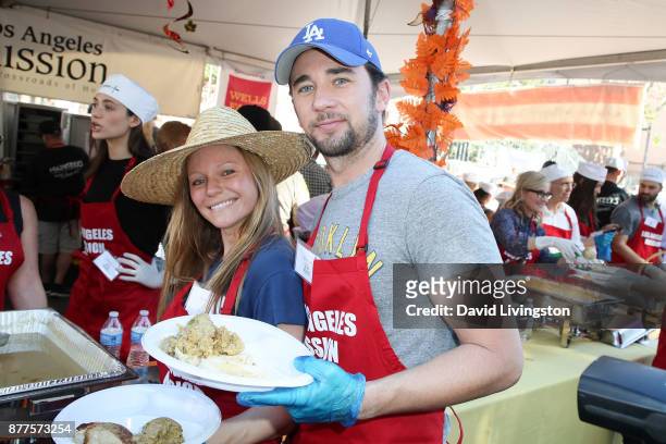 Marci Miller and Billy Flynn are seen at the Los Angeles Mission Thanksgiving Meal for the homeless at the Los Angeles Mission on November 22, 2017...