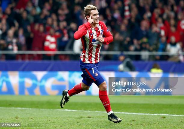 Antoine Griezmann of Atletico Madrid celebrates after scoring his team's opening goal during the UEFA Champions League group C match between Atletico...