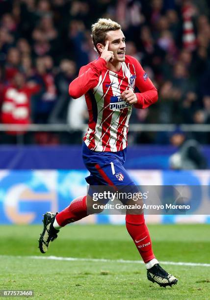 Antoine Griezmann of Atletico Madrid celebrates after scoring his team's opening goal during the UEFA Champions League group C match between Atletico...