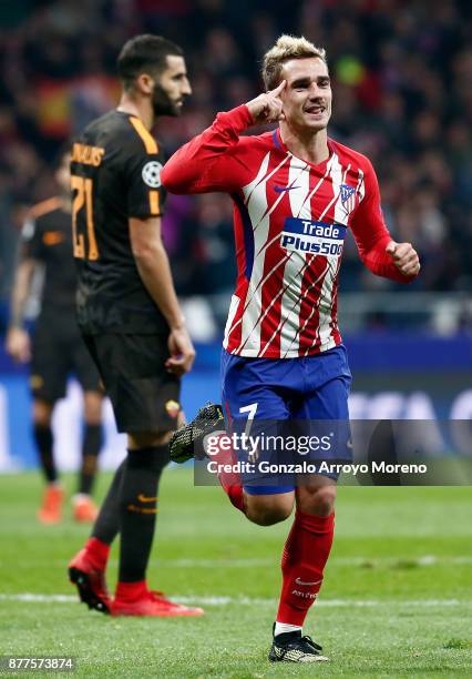 Antoine Griezmann of Atletico Madrid celebrates after scoring his team's opening goal during the UEFA Champions League group C match between Atletico...