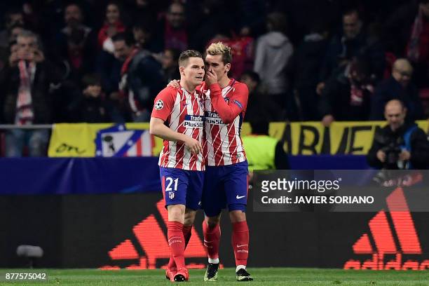 Atletico Madrid's French forward Kevin Gameiro celebrates with Atletico Madrid's French forward Antoine Griezmann after scoring his team's second...