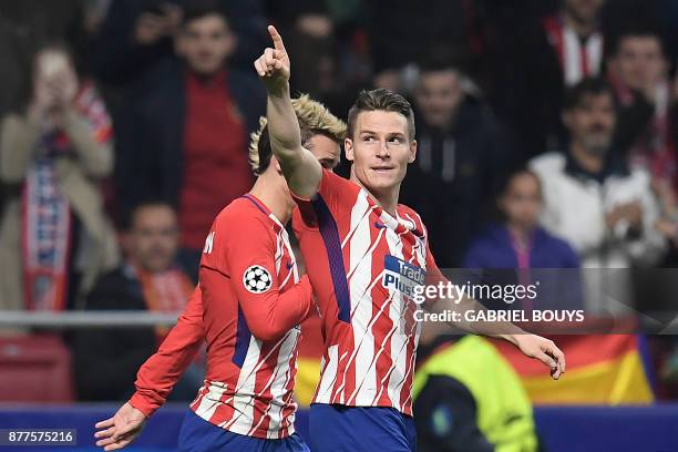 Atletico Madrid's French forward Kevin Gameiro celebrates with Atletico Madrid's French forward Antoine Griezmann after scoring his team's second...