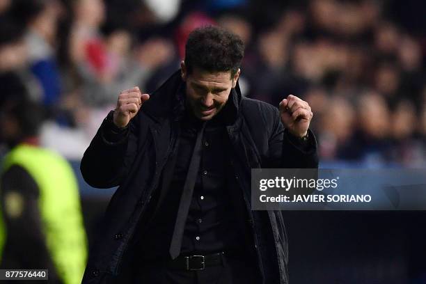 Atletico Madrid's Argentinian coach Diego Simeone celebrates after his team's second goal during the UEFA Champions League group C football match...