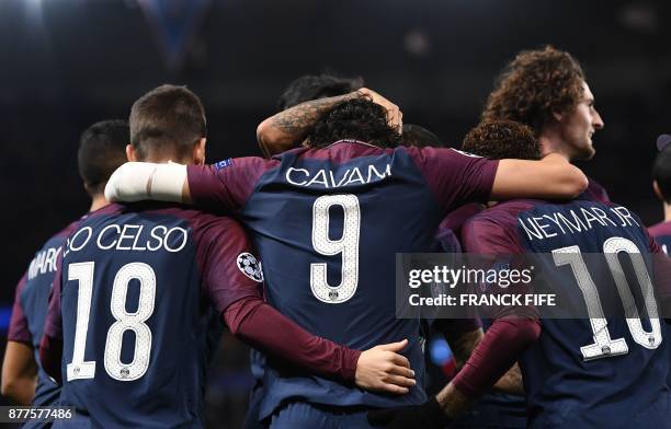 Paris Saint-Germain's Uruguayan striker Edinson Cavani celebrates with teammates Paris Saint-Germain's Argentinian midfielder Giovani Lo Celso ,...