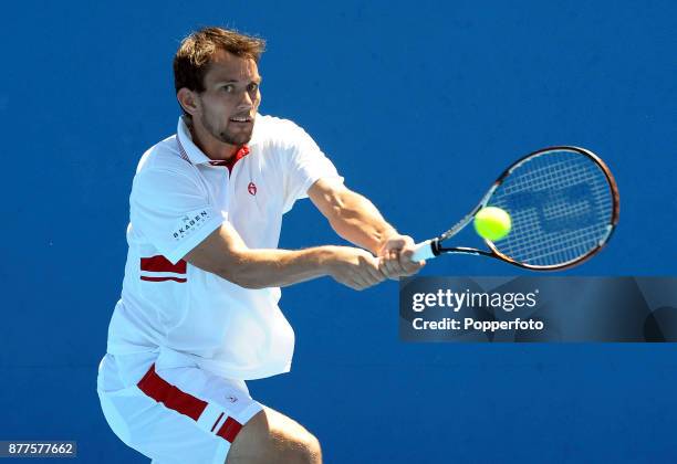 Frederik Nielsen of Denmark in action against Kevin Anderson of South Africa during a Men's Singles 1st round match on day one of the 2012 Australian...