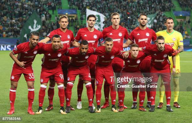 Olympiakos Piraeus players pose for a team photo before the start of during the UEFA Champions League match between Sporting Clube de Portugal and...