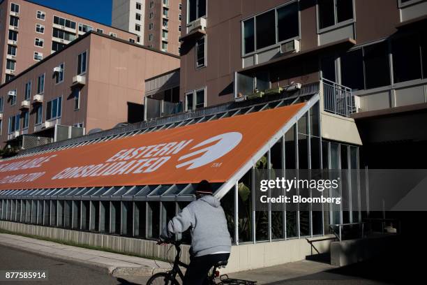 Bicyclist rides past commercial real estate on Roosevelt Island in New York, U.S., on Tuesday, Oct. 17, 2017. Cornell Techion, a new...