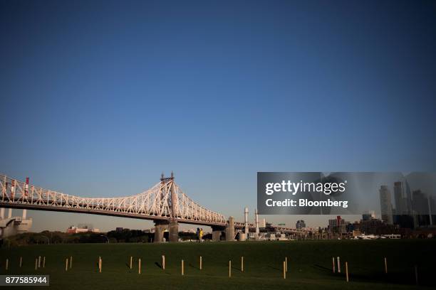 The Ed Koch Queensboro Bridge stand past the Cornell Technion campus on Roosevelt Island in New York, U.S., on Tuesday, Oct. 17, 2017. Cornell...